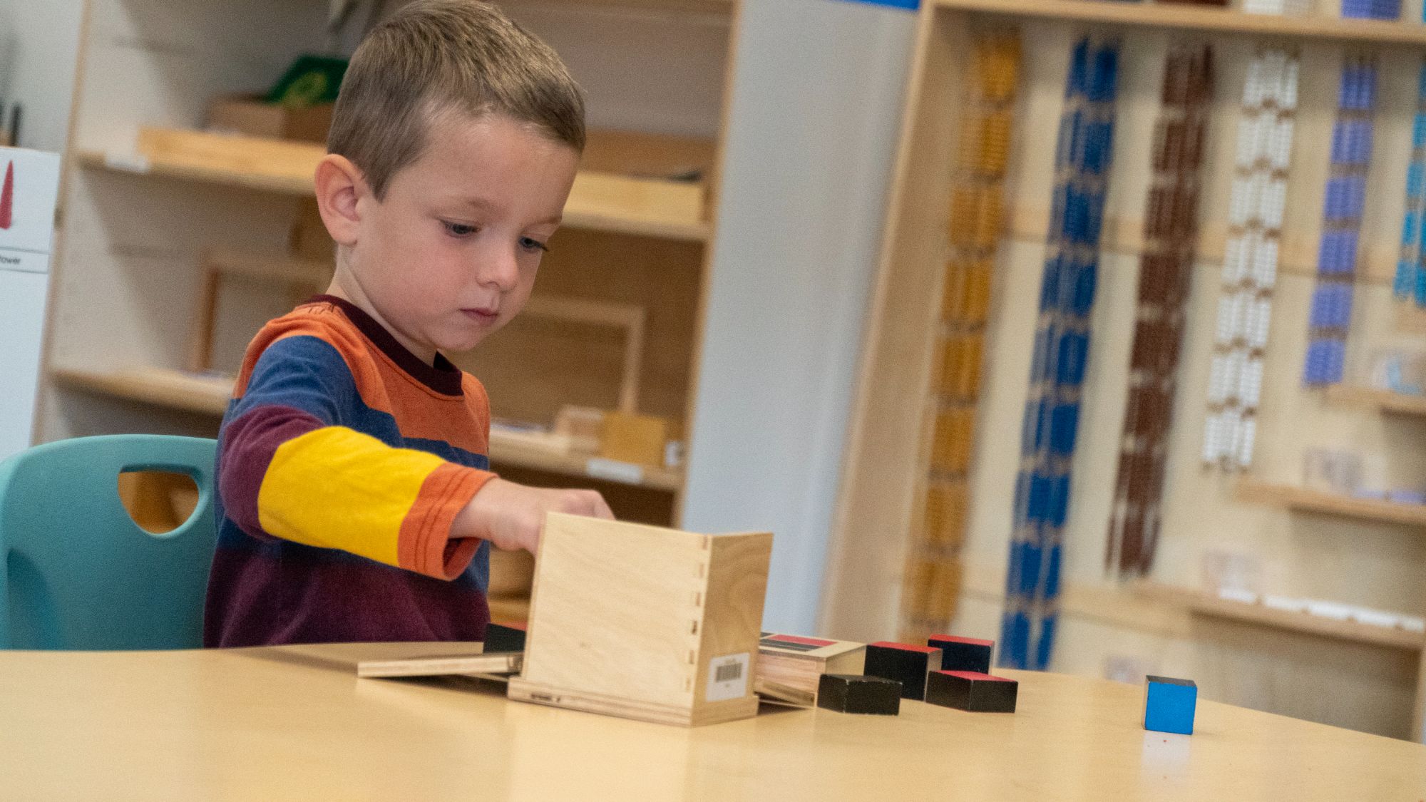 Kindergarten students playing with blocks
